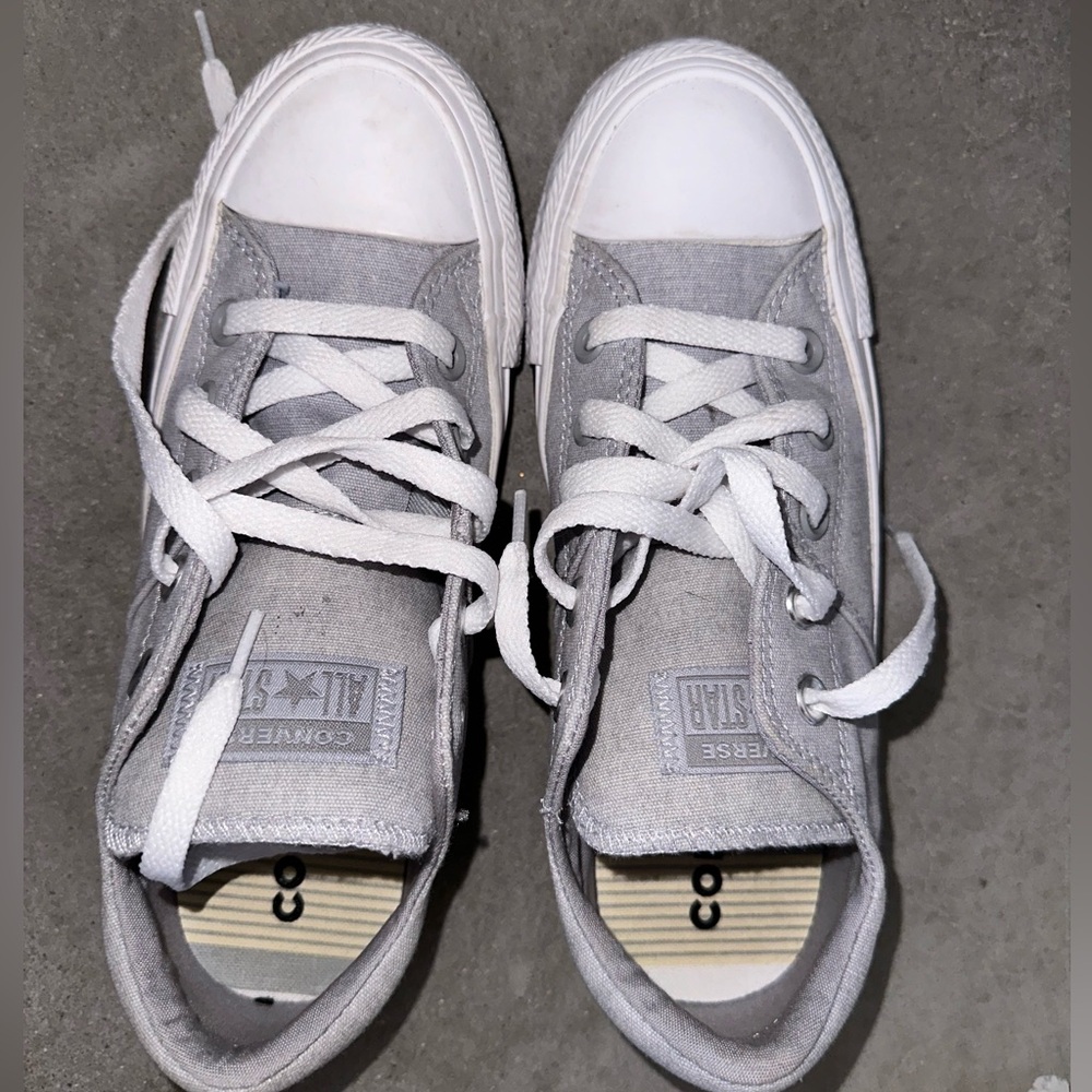 Converse gray shoes.